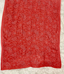 Pink fabric with white floral pattern embroidery detail