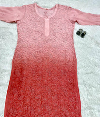 Pink embroidered viscose resham kurti on a textured white surface